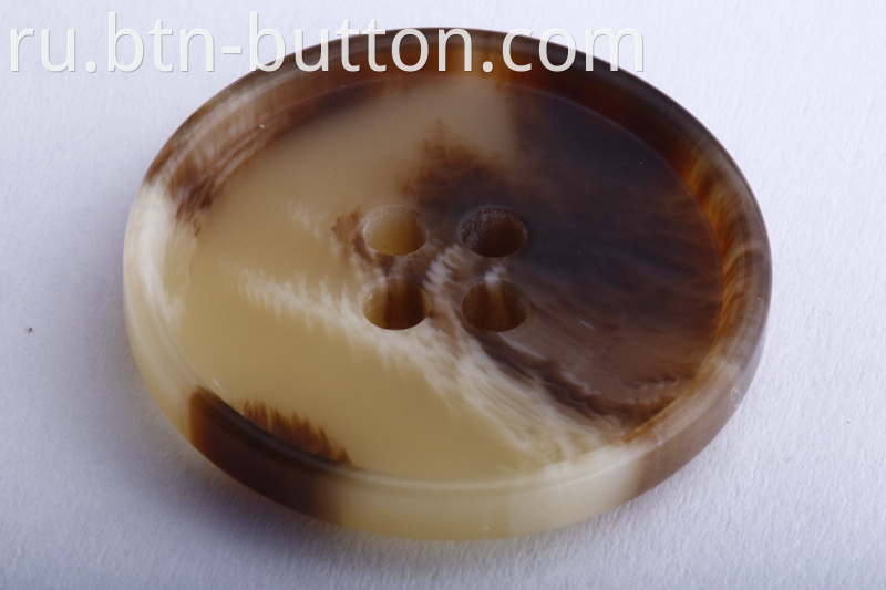 Unsaturated imitation horn resin buttons
